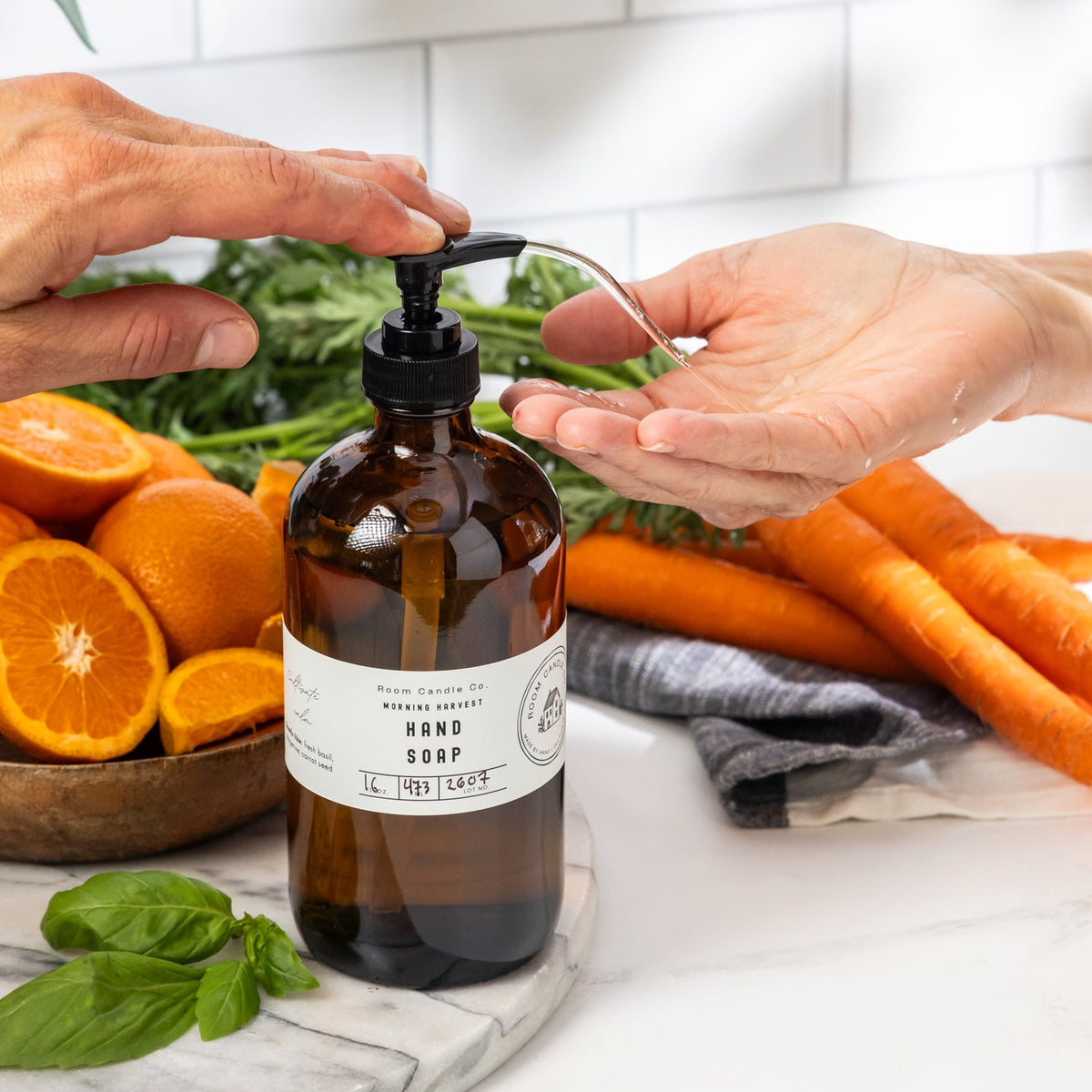 Morning Harvest Liquid Hand Soap by Room Candle Co. in a glass bottle with a pump dispenser.